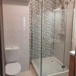 white with mosaic shower bathroom renovation