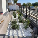 garden landscaping plant bed after side view